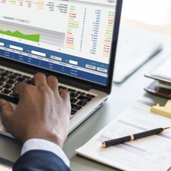 Black businessman using computer laptop
